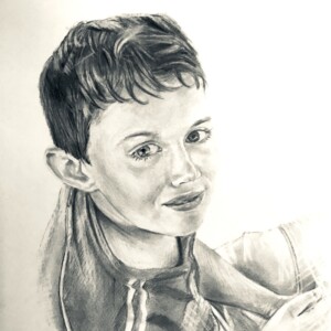 Portrait d'un jeune garçon très réaliste au crayon